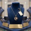 Collana in acciaio placcato oro Sole e Luna
